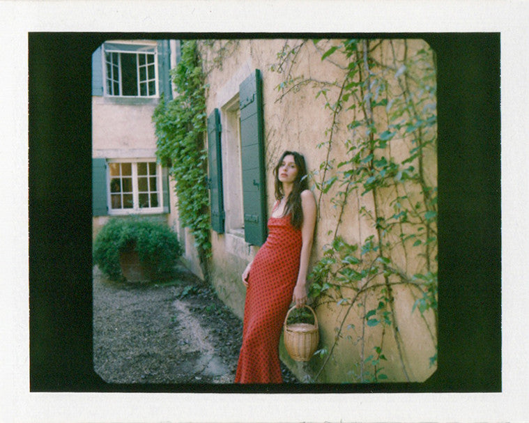 Red polka dot slip dress