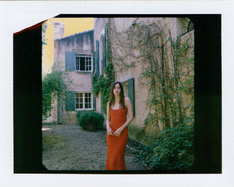 Red polka dot slip dress